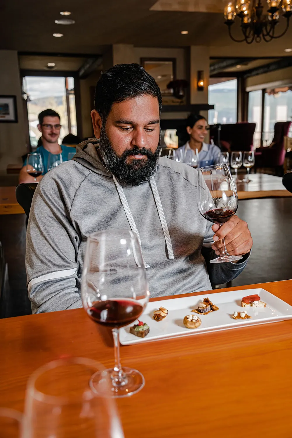 Person enjoying wine at Dirty Laundry winery