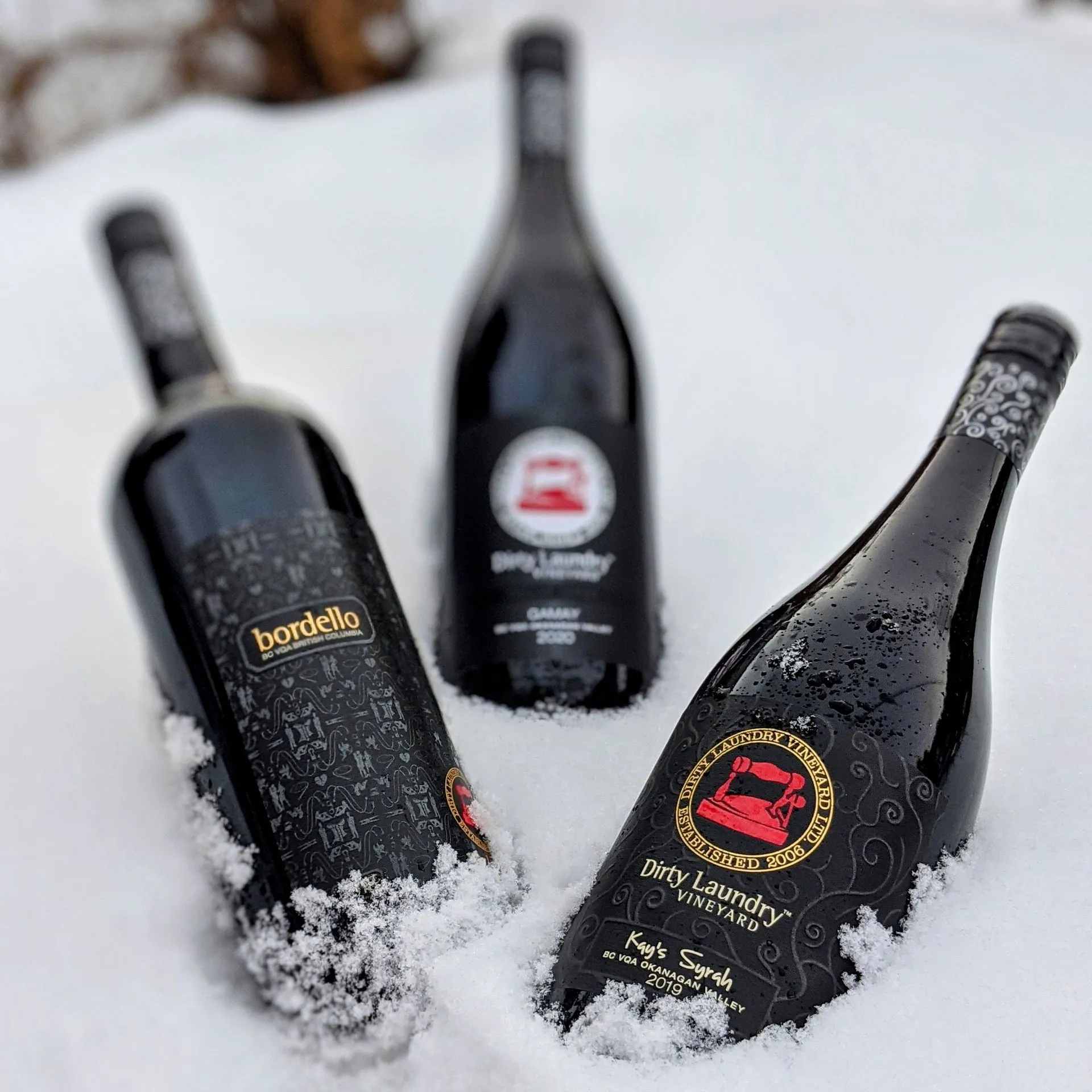 Dirty Laundry Wine bottles in the snow