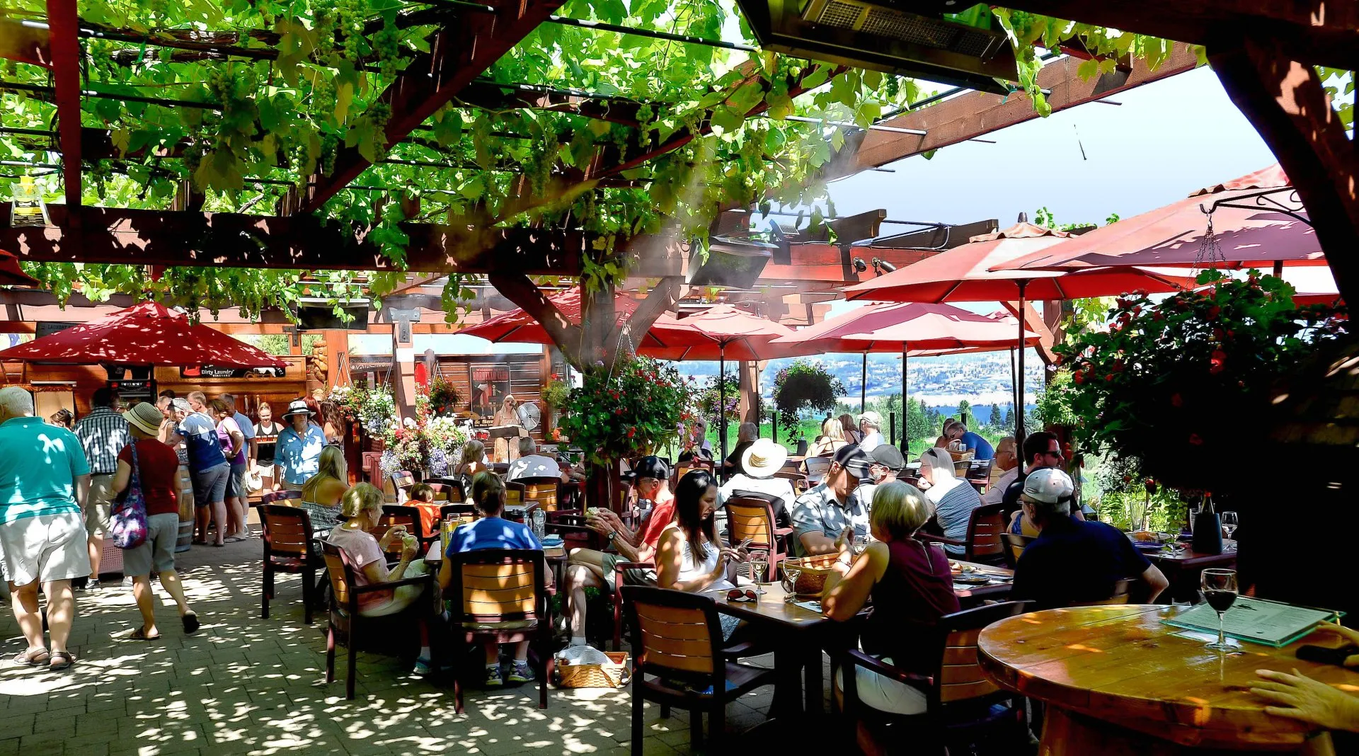 People enjoying food and wine at Dirty Laundry's patio