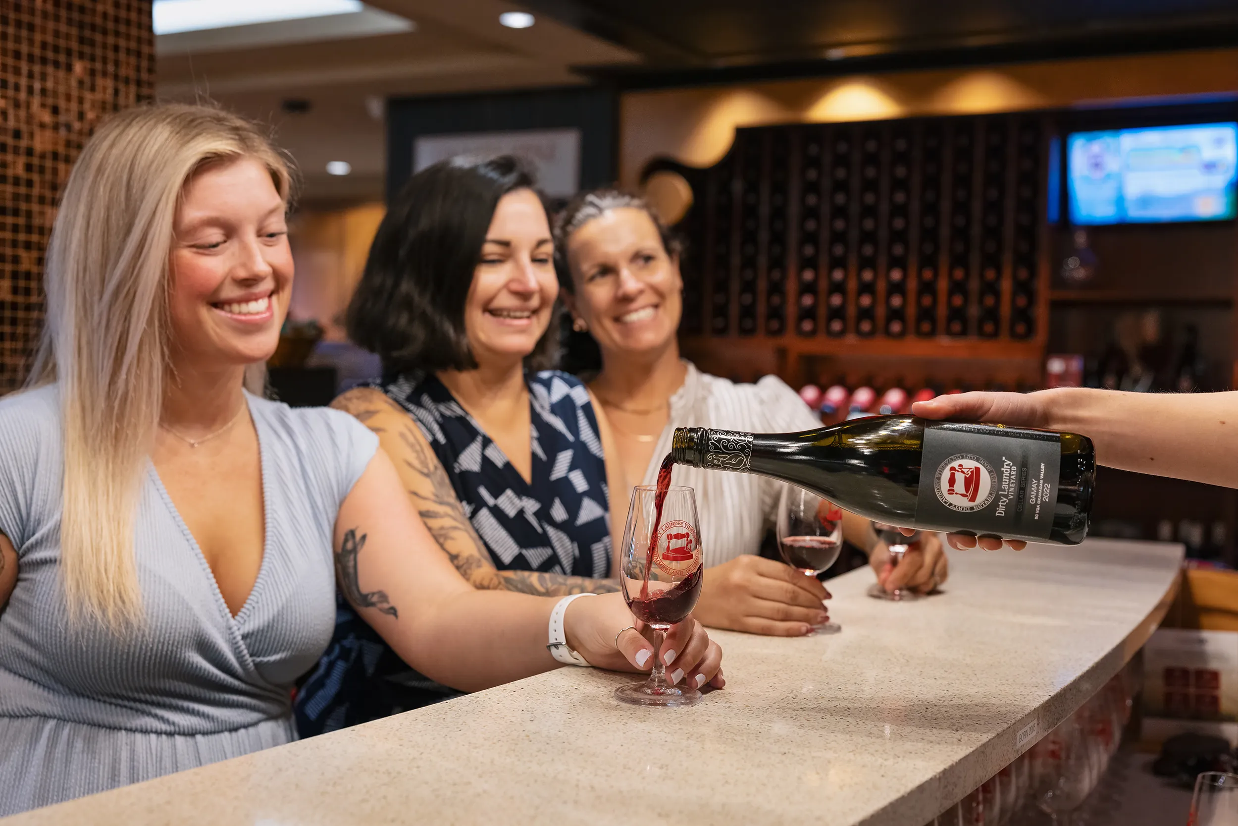 People enjoying a wine tasting at Dirty Laundry Winery